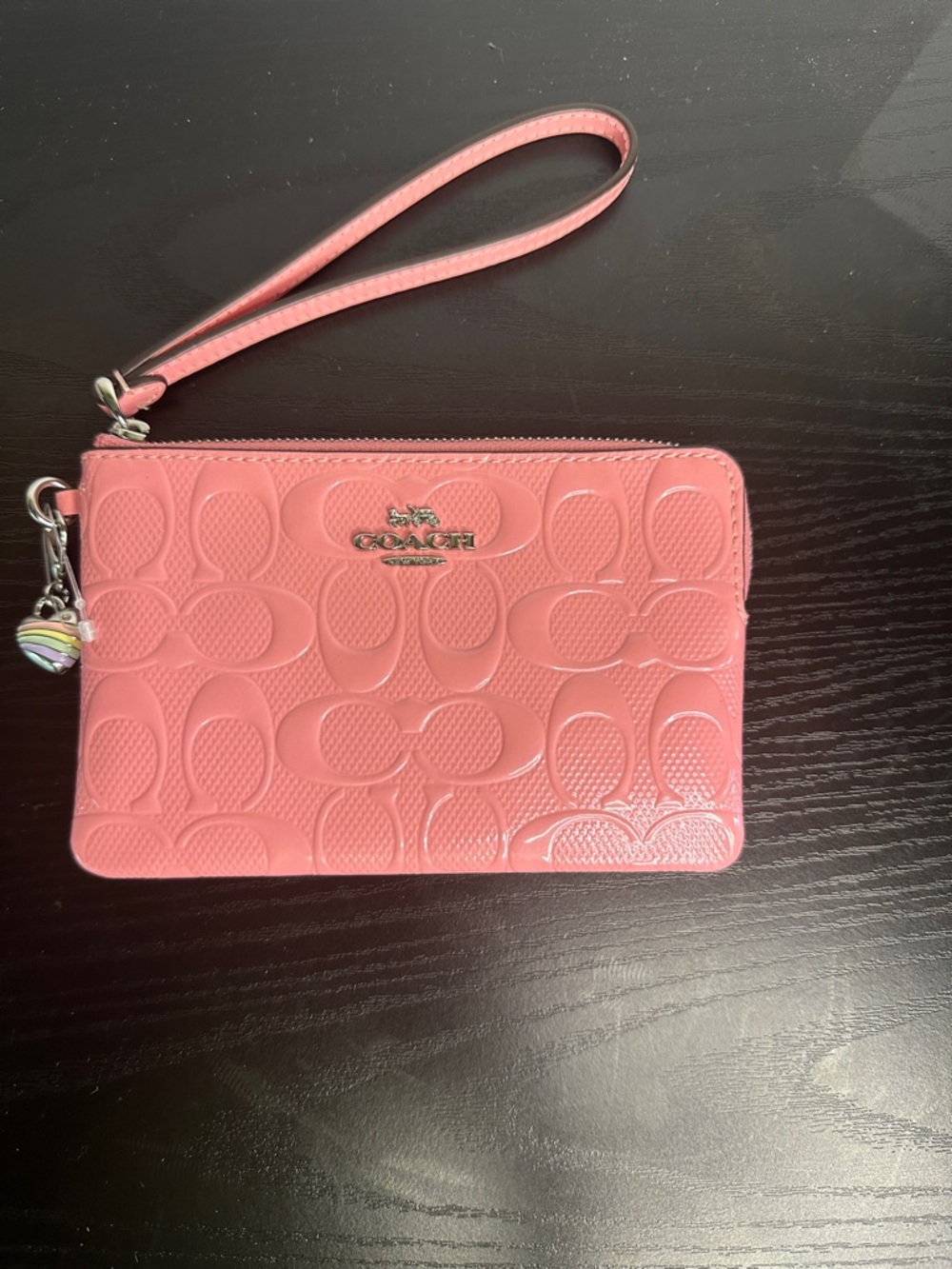 Corner Pink Patent Zip Embossed Wristlet In Signature Leather With Heart Charm